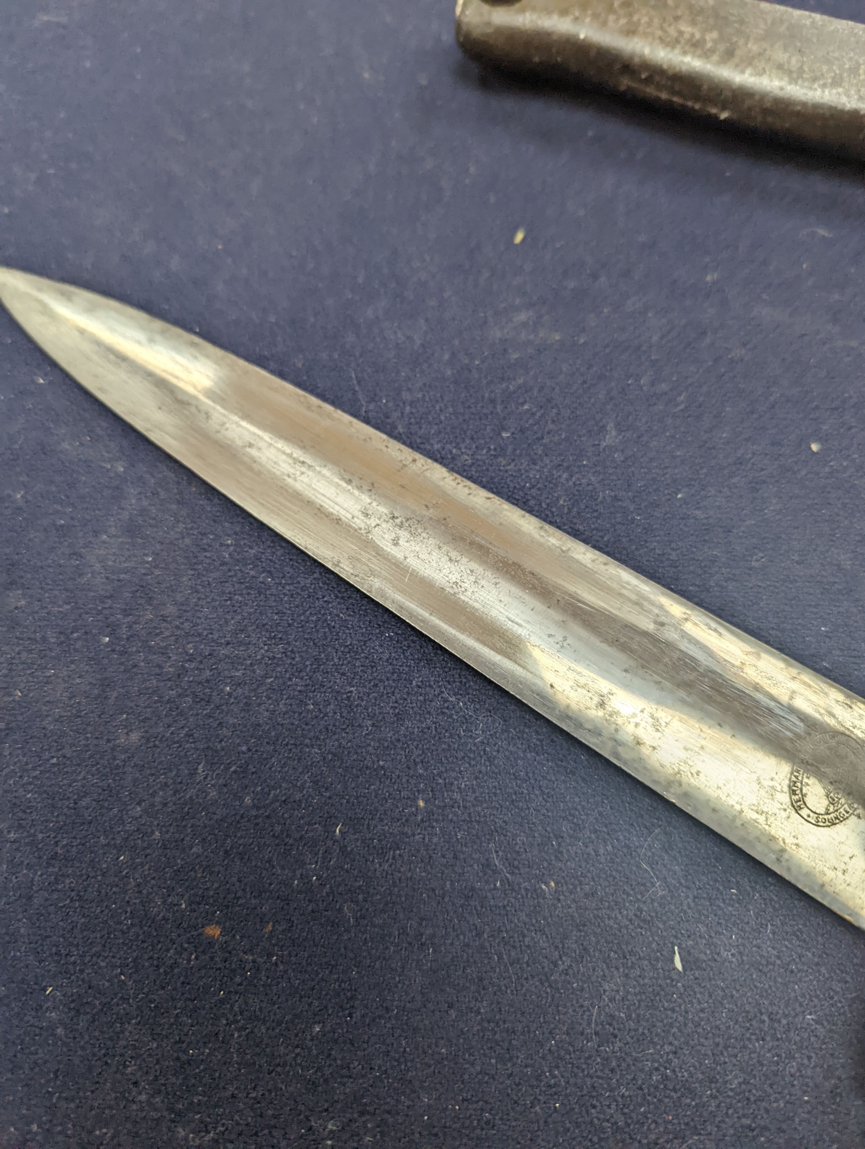A Third Reich SA dagger within sheath, blade 22cm., and a bayonet within scabbard
